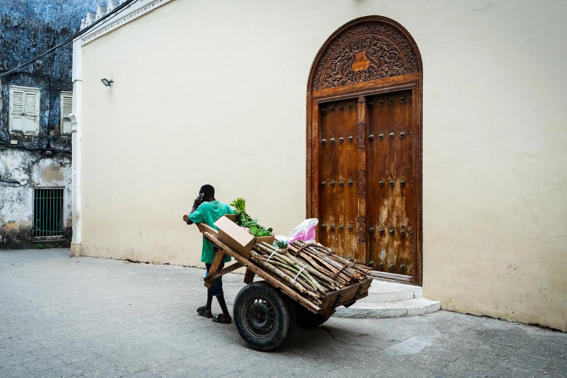 Stone Town Walking Tour historic UNESCO World Heritage architecture with ornate carved doors and balconies