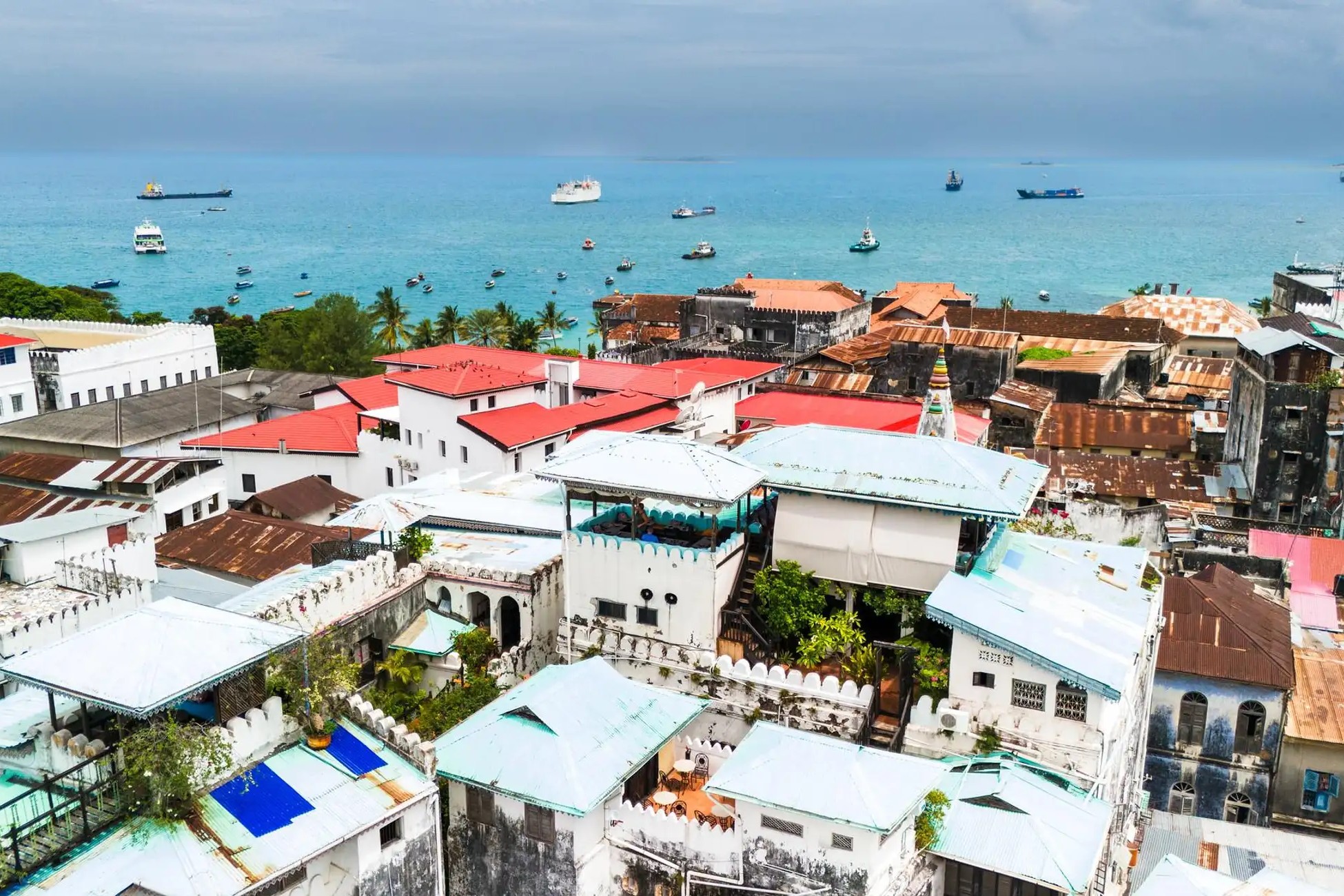 Stone Town Walking Tour Old Fort waterfront view with stone walls and Indian Ocean backdrop